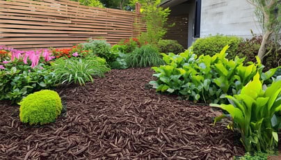 A beautiful garden bed freshly mulched, showcasing