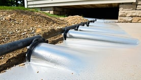 A well-installed exterior drainage system showing